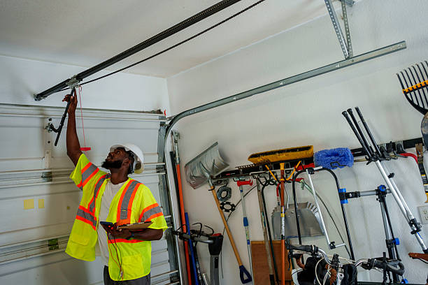 Professional Garage Door Panel Replacement technician working in Factoryville, PA